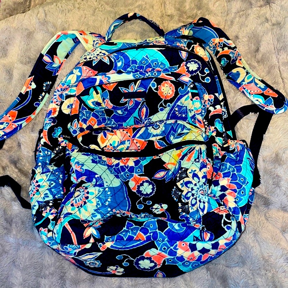 This is a backpack from Vera Bradley and has multiple pockets